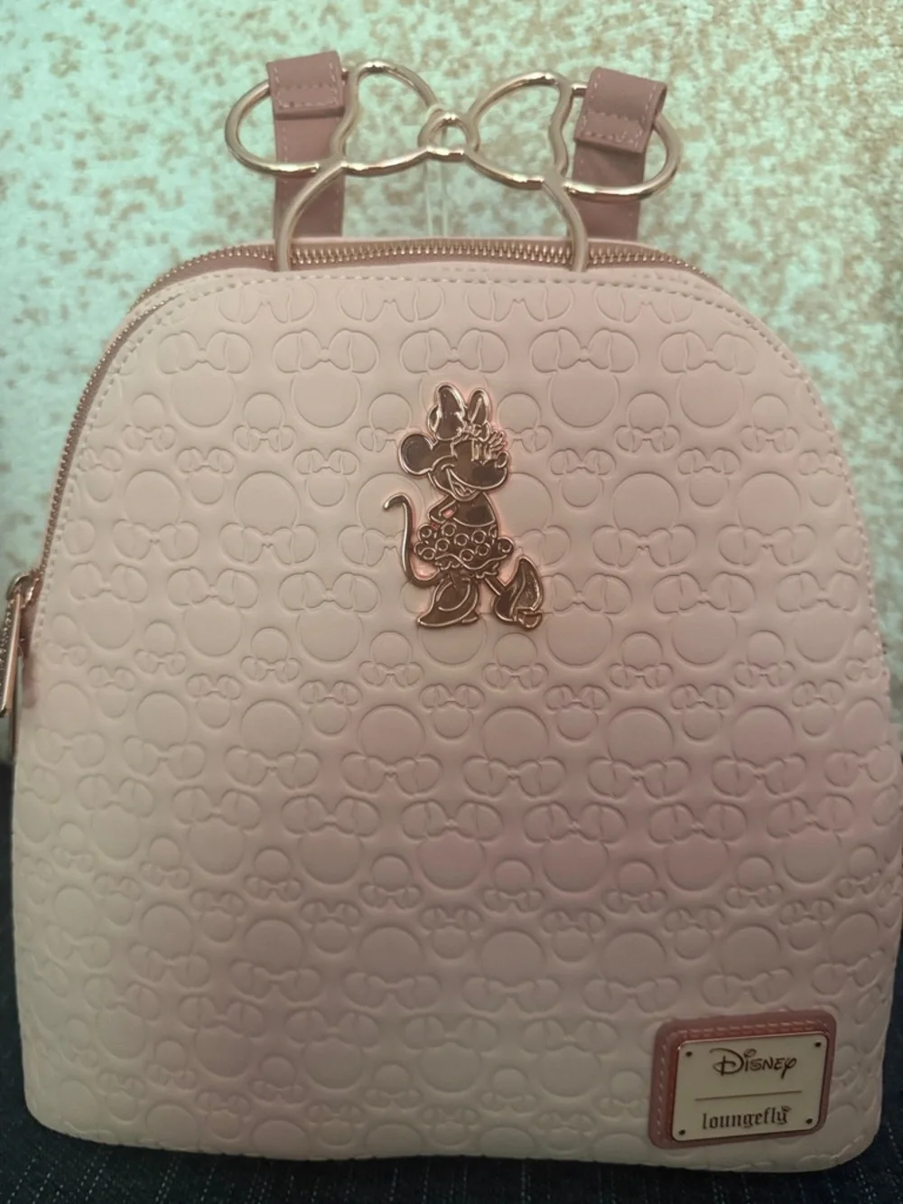 Loungefly Minnie Mouse Embossed Pink Mini Backpack with Rose Gold Bow